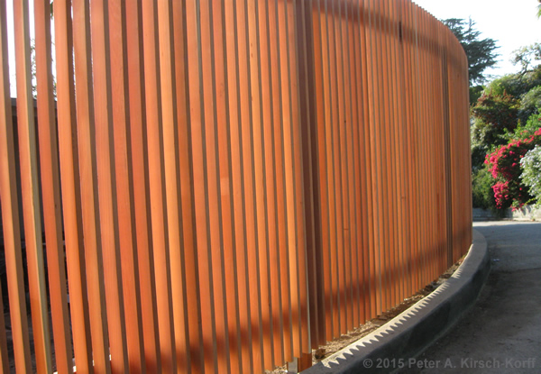 Photo of Los Angeles Curved, Sloped Vertical Slat Redwood Fence in Hollywood Hills,CA