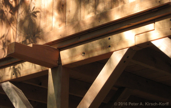 Greene & Greene Inspired Redwood Tree House detail showing interlocking beam construction to match main house - Pasadena, CA